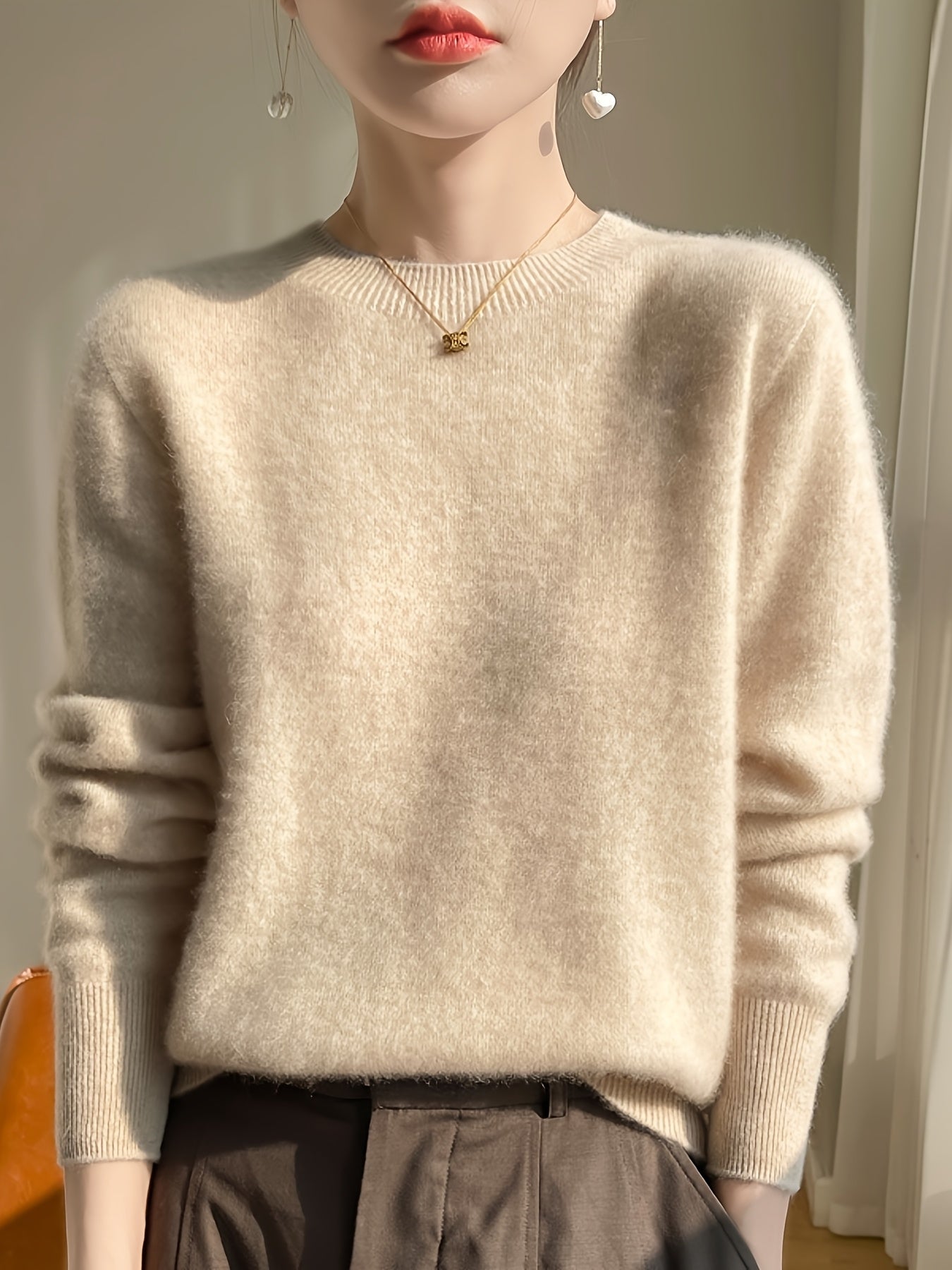 Autumn and winter crew neck pullover knitted sweater long-sleeved warm sweater fashionable solid color matching white camel beige women's top
